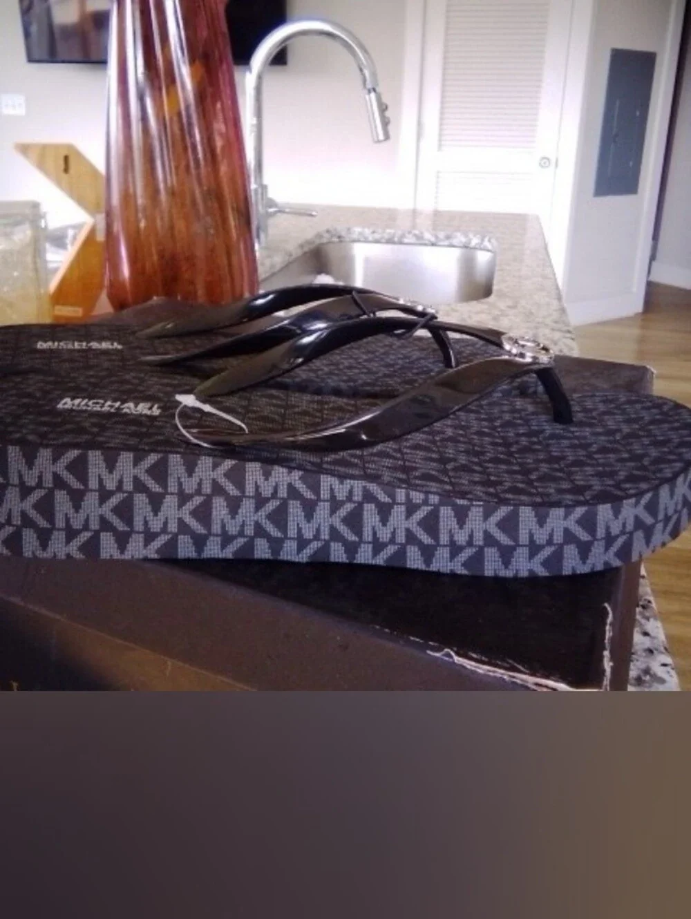 Michael Kors Black Flip Flops with Gold MK Medallions